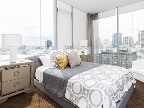 Floor-to-ceiling windows in a Franklin Tower bedroom